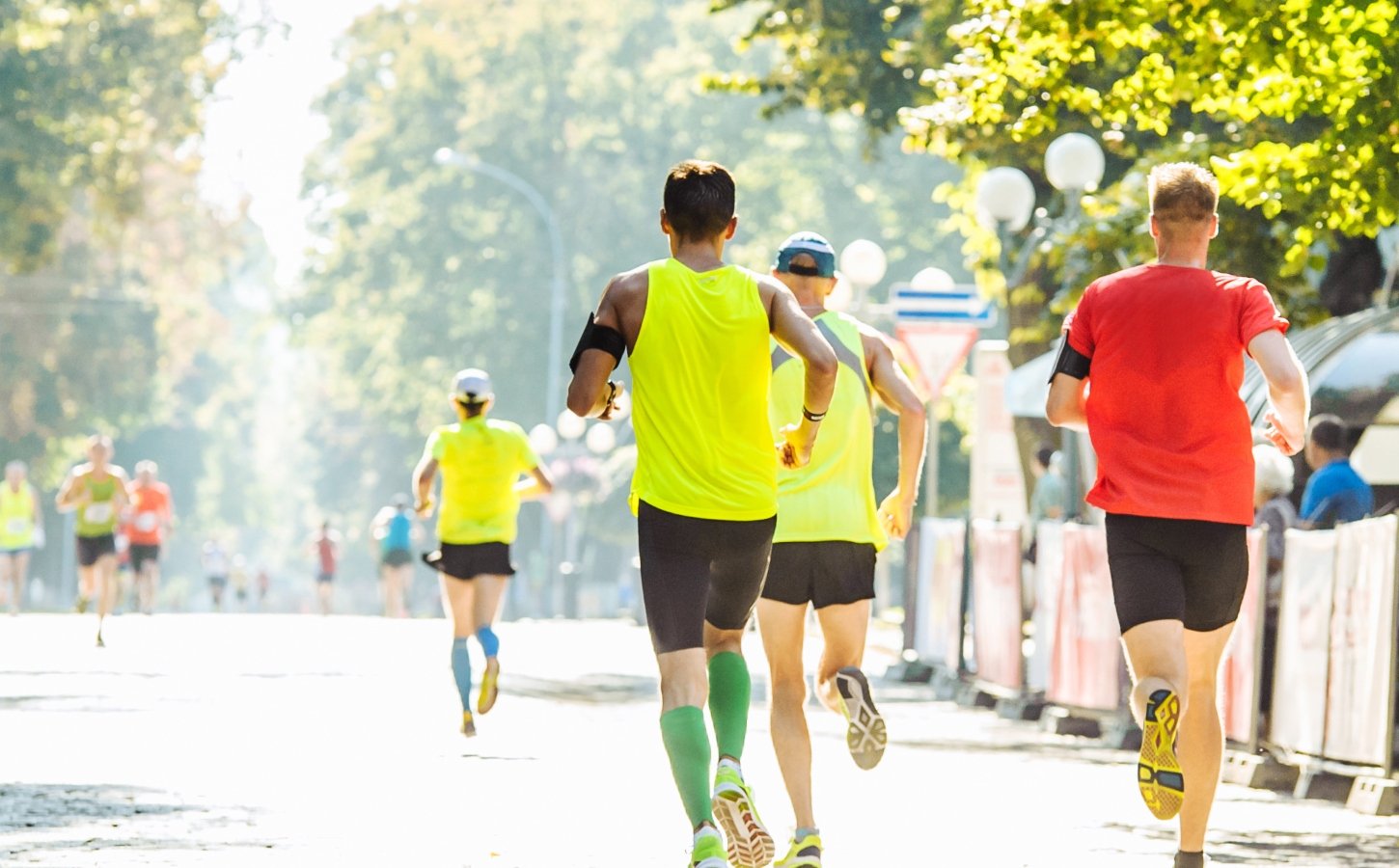athletes run a race in the park
