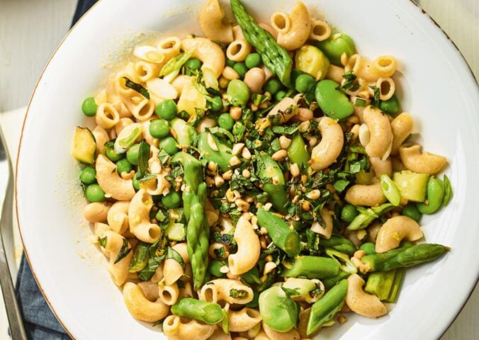 a summer veg and white bean pasta with edamame and asparagus